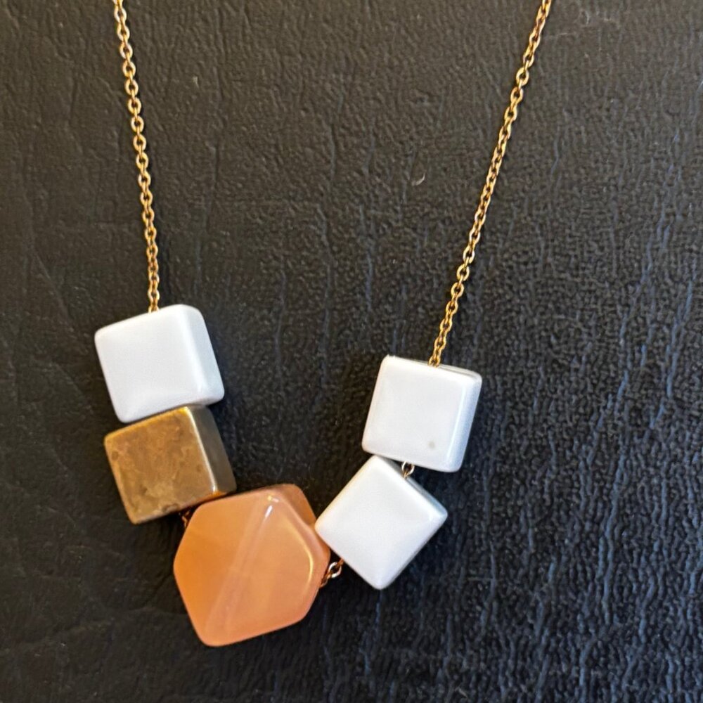 Cute dice necklace, Pink, gold and white dice on 18" gold plated chain.